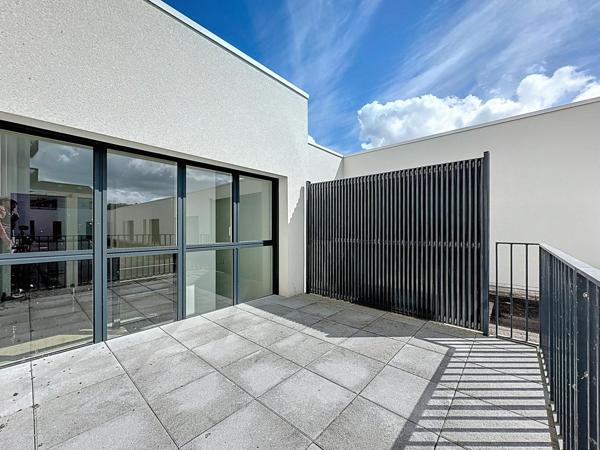 Duplex contemporain de prestige avec garage et cave