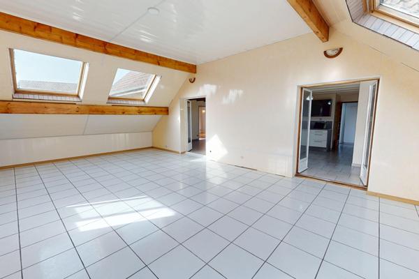 Appartement en duplex de 178m2 avec cour et terrain privatif