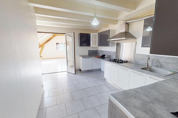 Appartement en duplex de 178m2 avec cour et terrain privatif