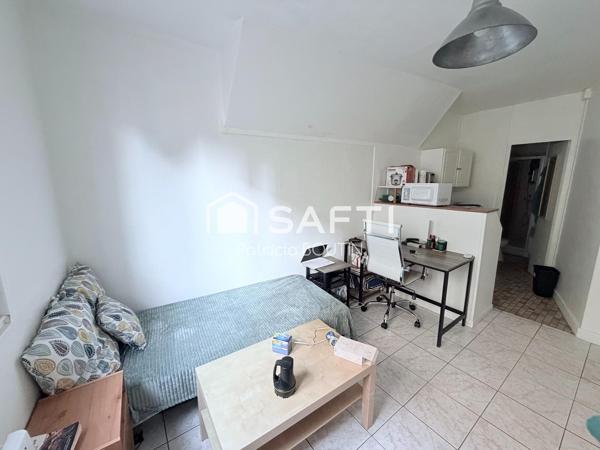 IMMEUBLE DE 5 LOGEMENTS + UNE COUR DANS LE CENTRE VILLE DE NIORT