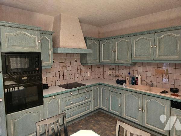 Maison élevée sur sous sol de 107 m2 sur terrain de 3060 m2.