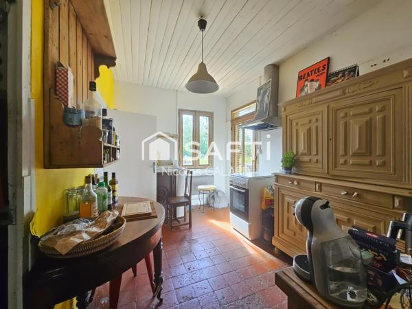 Maison mitoyenne au calme