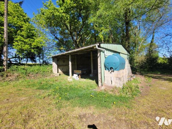 Propriété dans hameau en campagne