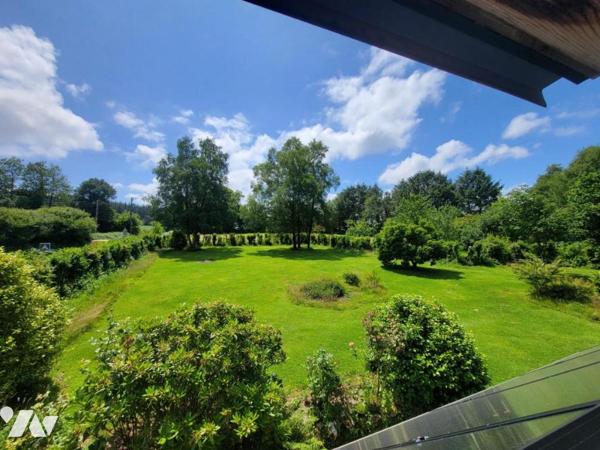 Propriété dans hameau en campagne