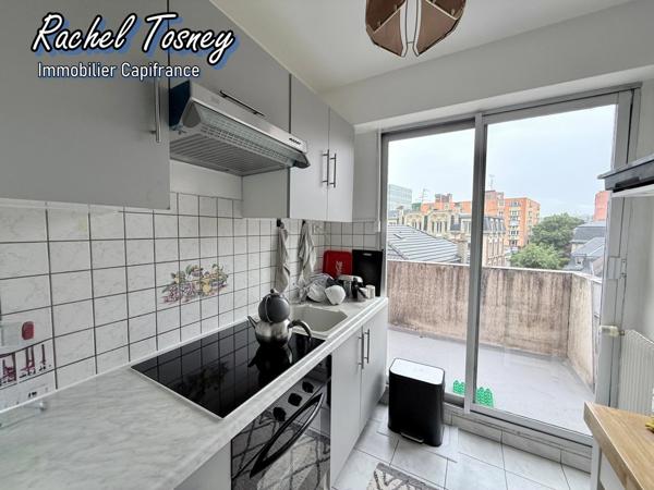 Belfort hyper-centre – Appartement T2  avec terrasse et balcon, un cocon rare au calme avec parking !