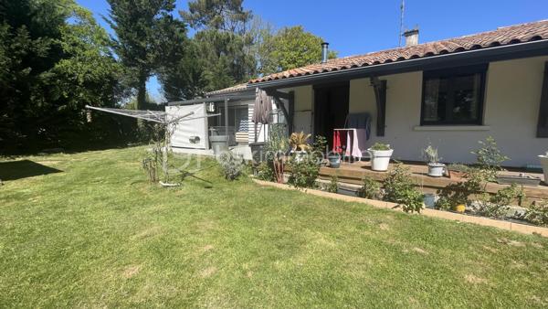 À seulement 4 km du premier centre commercial de Bergerac, découvrez cette spacieuse maison de plain-pied de 150 m², offrant 6 chambres, idéale pour une grande famille ou un projet d’accueil.
Située au fond d’une impasse, elle bénéficie d’un emplacement privilégié alliant calme absolu et proximité des commodités.
Dès l’entrée, vous serez séduit par une belle cuisine équipée de 15 m², ouverte sur un vaste séjour lumineux de 36 m². Cet espace de vie convivial est sublimé par un poêle à bois, apportant chaleur et confort au quotidien.
Un cellier/buanderie attenant de 5 m² complète cet espace, ainsi qu’un second volume de rangement de 8 m², idéal pour organiser facilement votre intérieur.
Côté nuit, la maison propose 6 chambres aux surfaces comprises entre 10 et 13 m², accompagnées de 2 salles d’eau dont une avec WC et 1 WC indépendants avec lavabo, offrant praticité et confort pour toute la famille.
Côté prestations, vous bénéficierez d’un excellent niveau de confort : double vitrage, chauffage gainable par pompe à chaleur, ainsi que 5 climatisations réversibles (split). L’eau chaude est assurée par un ballon thermodynamique et un adoucisseur d’eau, portail automatisé et volets roulants électriques avec domotique. 
À l’extérieur, tout est pensé pour profiter pleinement des beaux jours : deux terrasses couvertes, dont une avec jacuzzi, une piscine sécurisée au chlore de 10 x 5 mètres (rénovée en 2019, encore sous garantie décennale), ainsi qu’un espace barbecue convivial. Un abri bois et une dépendance pouvant accueillir une cuisine d’été viennent enrichir ces prestations.
Le stationnement est facilité grâce à deux garages, dont un motorisé, ainsi qu’un grand carport pouvant accueillir un camping-car. Deux cabanons de jardin complètent l’ensemble.
Le tout est implanté sur un terrain de plus de 2 400 m², entièrement clos et sécurisé par un portail motorisé, garantissant intimité et tranquillité.
Assainissement collectif (tout-à-l’égout).
Une maison aux volumes généreux, alliant confort, fonctionnalité et cadre de vie paisible.
Visites possibles 7 jours sur 7.
Just 4 km from the first shopping center of bergerac, discover this spacious single-storey house of 150 m 2, offering 6 bedrooms, ideal for a large family or a hospitality project.
Located at the bottom of a cul-de-sac, it enjoys a privileged location combining absolute calm and proximity to amenities.
From the entrance, you will be seduced by a beautiful kitchen of 15 m 2, open on a large bright living room of 36 m 2. This friendly living space is enhanced by a wood stove, bringing warmth and comfort to everyday life.
An adjoining cellar/laundry room of 5 m2 completes this space, as well as a second storage volume of 8 m 2, ideal for easily organizing your interior.
Night side, the house offers 6 rooms with areas between 10 and 13 m 2, accompanied by 2 bathrooms including one with WC and 1 separate toilet with sink, offering convenience and comfort for the whole family.
On the benefits side, you will enjoy an excellent level of comfort: double glazing, ducted heating by heat pump, as well as 5 reversible air conditioning (split). The hot water is provided by a thermodynamic tank and a water softener, automated gate and electric shutters with home automation. 
Outside, everything has been designed to make the most of sunny days: two covered terraces, one with a jacuzzi, a 10 x 5 metre chlorine-protected swimming pool (renovated in 2019, still under ten-year warranty), as well as a friendly barbecue area. A wooden shelter and an outbuilding that can accommodate a summer kitchen enrich these services.
Parking is facilitated by two garages, including one motorized, and a large carport that can accommodate a camper. Two garden sheds complete the set.
The whole is located on a plot of more than 2,400 m 2, fully enclosed and secured by a motorized gate, guaranteeing privacy and tranquility.
Collective sanitation (mains drainage).
A house with generous volumes, combining comfort, functionality and peaceful living environment.
Visits possible 7 days a week.