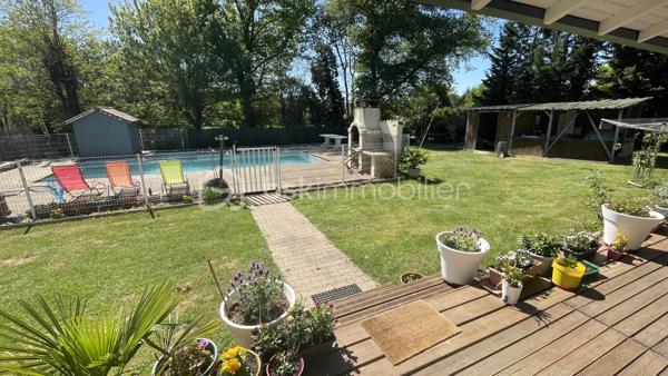 À seulement 4 km du premier centre commercial de Bergerac, découvrez cette spacieuse maison de plain-pied de 150 m², offrant 6 chambres, idéale pour une grande famille ou un projet d’accueil.
Située au fond d’une impasse, elle bénéficie d’un emplacement privilégié alliant calme absolu et proximité des commodités.
Dès l’entrée, vous serez séduit par une belle cuisine équipée de 15 m², ouverte sur un vaste séjour lumineux de 36 m². Cet espace de vie convivial est sublimé par un poêle à bois, apportant chaleur et confort au quotidien.
Un cellier/buanderie attenant de 5 m² complète cet espace, ainsi qu’un second volume de rangement de 8 m², idéal pour organiser facilement votre intérieur.
Côté nuit, la maison propose 6 chambres aux surfaces comprises entre 10 et 13 m², accompagnées de 2 salles d’eau dont une avec WC et 1 WC indépendants avec lavabo, offrant praticité et confort pour toute la famille.
Côté prestations, vous bénéficierez d’un excellent niveau de confort : double vitrage, chauffage gainable par pompe à chaleur, ainsi que 5 climatisations réversibles (split). L’eau chaude est assurée par un ballon thermodynamique et un adoucisseur d’eau, portail automatisé et volets roulants électriques avec domotique. 
À l’extérieur, tout est pensé pour profiter pleinement des beaux jours : deux terrasses couvertes, dont une avec jacuzzi, une piscine sécurisée au chlore de 10 x 5 mètres (rénovée en 2019, encore sous garantie décennale), ainsi qu’un espace barbecue convivial. Un abri bois et une dépendance pouvant accueillir une cuisine d’été viennent enrichir ces prestations.
Le stationnement est facilité grâce à deux garages, dont un motorisé, ainsi qu’un grand carport pouvant accueillir un camping-car. Deux cabanons de jardin complètent l’ensemble.
Le tout est implanté sur un terrain de plus de 2 400 m², entièrement clos et sécurisé par un portail motorisé, garantissant intimité et tranquillité.
Assainissement collectif (tout-à-l’égout).
Une maison aux volumes généreux, alliant confort, fonctionnalité et cadre de vie paisible.
Visites possibles 7 jours sur 7.
Just 4 km from the first shopping center of bergerac, discover this spacious single-storey house of 150 m 2, offering 6 bedrooms, ideal for a large family or a hospitality project.
Located at the bottom of a cul-de-sac, it enjoys a privileged location combining absolute calm and proximity to amenities.
From the entrance, you will be seduced by a beautiful kitchen of 15 m 2, open on a large bright living room of 36 m 2. This friendly living space is enhanced by a wood stove, bringing warmth and comfort to everyday life.
An adjoining cellar/laundry room of 5 m2 completes this space, as well as a second storage volume of 8 m 2, ideal for easily organizing your interior.
Night side, the house offers 6 rooms with areas between 10 and 13 m 2, accompanied by 2 bathrooms including one with WC and 1 separate toilet with sink, offering convenience and comfort for the whole family.
On the benefits side, you will enjoy an excellent level of comfort: double glazing, ducted heating by heat pump, as well as 5 reversible air conditioning (split). The hot water is provided by a thermodynamic tank and a water softener, automated gate and electric shutters with home automation. 
Outside, everything has been designed to make the most of sunny days: two covered terraces, one with a jacuzzi, a 10 x 5 metre chlorine-protected swimming pool (renovated in 2019, still under ten-year warranty), as well as a friendly barbecue area. A wooden shelter and an outbuilding that can accommodate a summer kitchen enrich these services.
Parking is facilitated by two garages, including one motorized, and a large carport that can accommodate a camper. Two garden sheds complete the set.
The whole is located on a plot of more than 2,400 m 2, fully enclosed and secured by a motorized gate, guaranteeing privacy and tranquility.
Collective sanitation (mains drainage).
A house with generous volumes, combining comfort, functionality and peaceful living environment.
Visits possible 7 days a week.