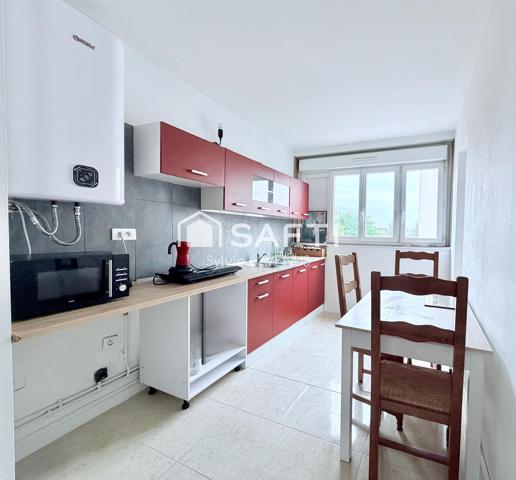 A SOISSONS 02, QUARTIER MAUPAS, APPARTEMENT 4 P. AVEC BALCON, CAVE ET GARAGE.