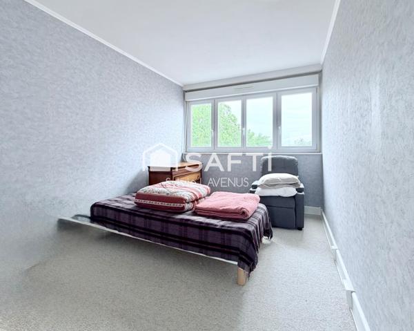A SOISSONS 02, QUARTIER MAUPAS, APPARTEMENT 4 P. AVEC BALCON, CAVE ET GARAGE.