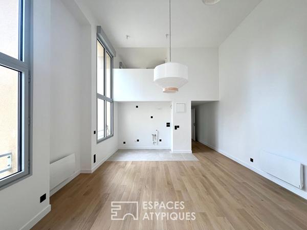T3 duplex lumineux au style loft dans un lieu emblématique
