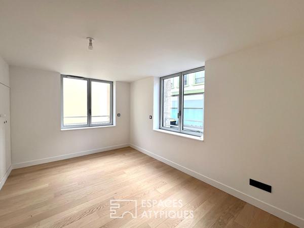 T3 duplex lumineux au style loft dans un lieu emblématique