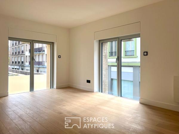 T3 duplex lumineux au style loft dans un lieu emblématique