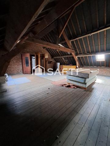 Maison de centre  ville vivable de plain pied avec terrain