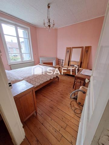 Maison de centre  ville vivable de plain pied avec terrain