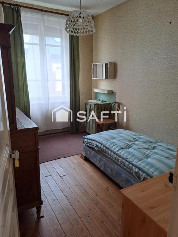 Maison de centre  ville vivable de plain pied avec terrain