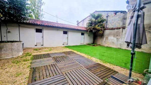 Magnifique maison rénovée au cœur du village d'Aiguillon – 150 m² habitables avec jardin