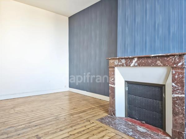 Immeuble de rapport au Grand-Lucé comprenant un local commercial et un appartement