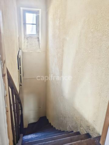 Immeuble de rapport au Grand-Lucé comprenant un local commercial et un appartement