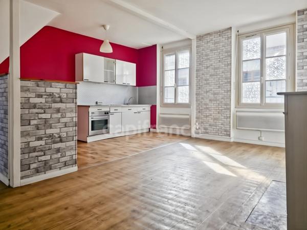 Immeuble de rapport au Grand-Lucé comprenant un local commercial et un appartement