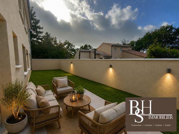 NEUF - Appartement 3 pièces d'environ 59m² avec terrasse, jardinet et parking dans résidence sécurisée