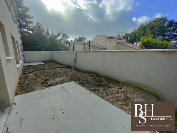 NEUF - Appartement 3 pièces d'environ 59m² avec terrasse, jardinet et parking dans résidence sécurisée