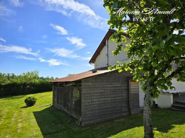 Maison Plain-pied avec garage et dépendance sur grand terrain clos