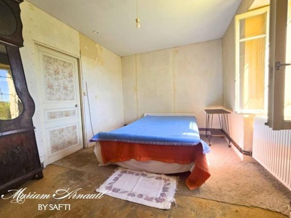 Maison Plain-pied avec garage et dépendance sur grand terrain clos