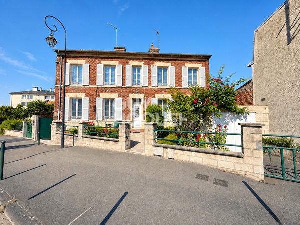 Maison proche centre ville avec jardin
