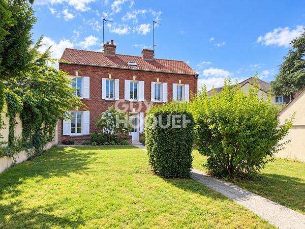 Maison proche centre ville avec jardin