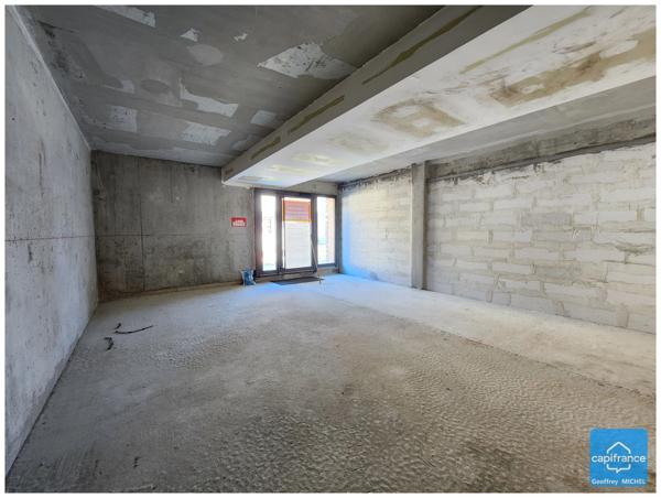 Local commercial à vendre à l’Alpe d’Huez – 49,70 m² – Box de stationnement