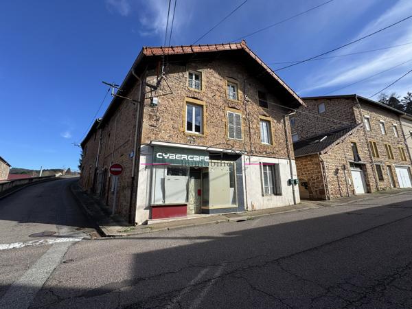Investissement à saisir à Cours-la-Ville : Immeuble de rapport plein de potentiel !