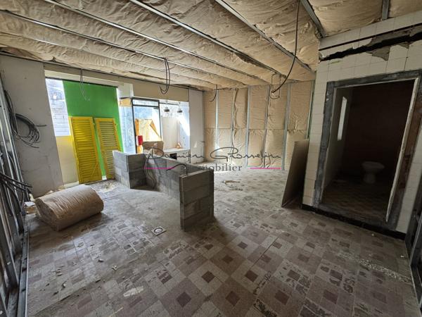 Investissement à saisir à Cours-la-Ville : Immeuble de rapport plein de potentiel !