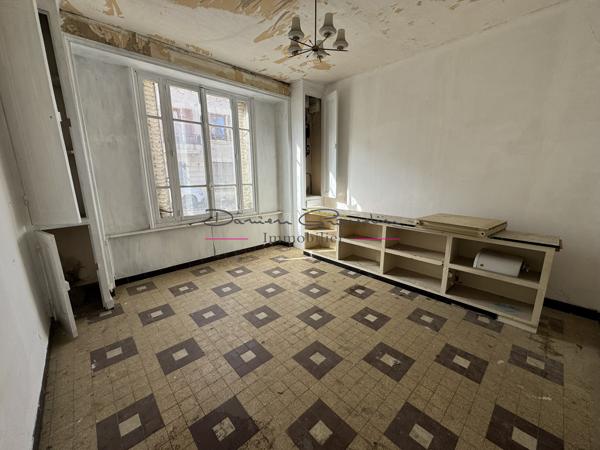 Investissement à saisir à Cours-la-Ville : Immeuble de rapport plein de potentiel !