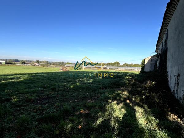 A VENDRE TERRAIN COMMERCIAL AVEC MAISON A FAUILLET