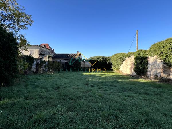 A VENDRE TERRAIN COMMERCIAL AVEC MAISON A FAUILLET