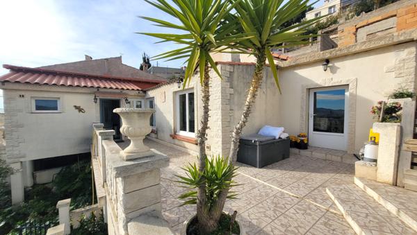 Marseille (13015) Maison type 5 avec Vue Mer sur terrain en restanque .