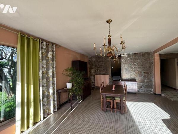 Maison à rénover quartier gare angle de rue passante