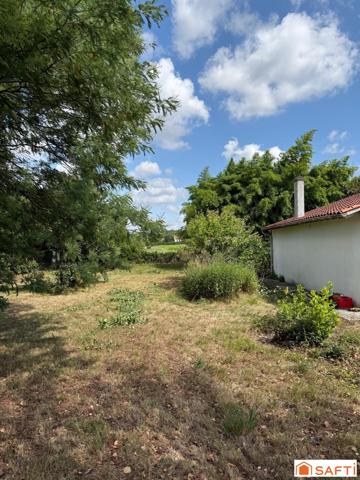 Maison T3 de plain pied avec garage sur une parcelle d'environ 1284 m2