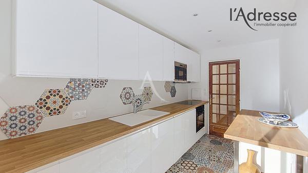 PUTEAUX/Centre ville 4/5 pièces de 97 m² avec parking boxé, 3 balcons