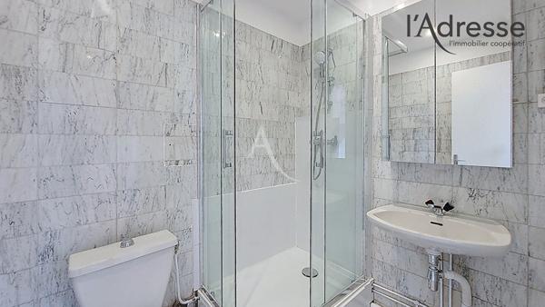 PUTEAUX/Centre ville 4/5 pièces de 97 m² avec parking boxé, 3 balcons