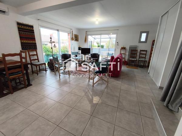 Maison avec jardin associant performance et charme prêts à vivre !