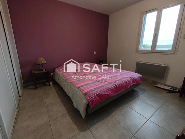 Maison avec jardin associant performance et charme prêts à vivre !