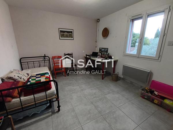 Maison avec jardin associant performance et charme prêts à vivre !