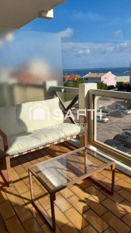 Arcachon bd de la plage - vue port et vue partielle mer - appartement de 68m2 avec 2 chambres, ascenseur, parking