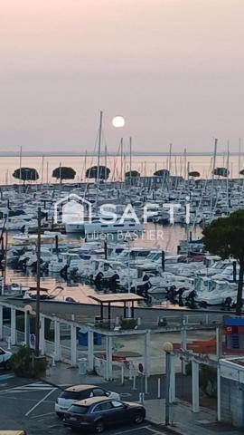 Arcachon bd de la plage - vue port et vue partielle mer - appartement de 68m2 avec 2 chambres, ascenseur, parking