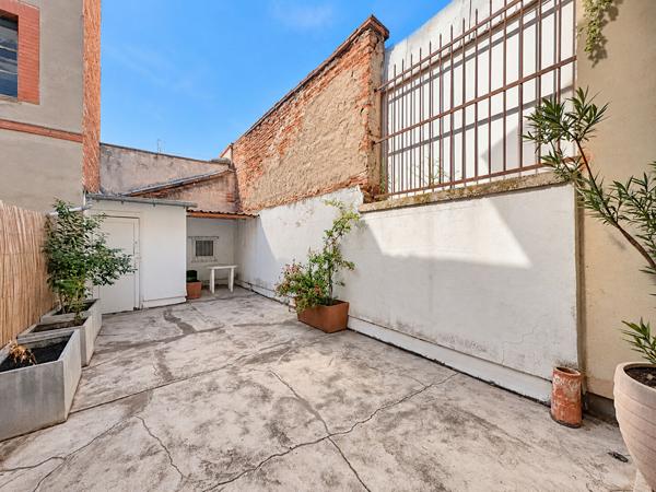 A VENDRE - Toulouse Matabiau - Appartement T2 dans immeuble toulousain avec grande terrasse