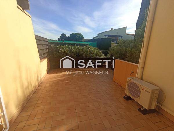 Appartement RDJ climatisé, terrasse Sud Est, emplacement véhicule privatif.