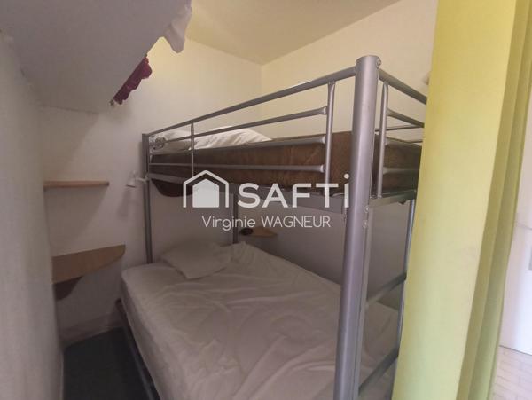 Appartement RDJ climatisé, terrasse Sud Est, emplacement véhicule privatif.