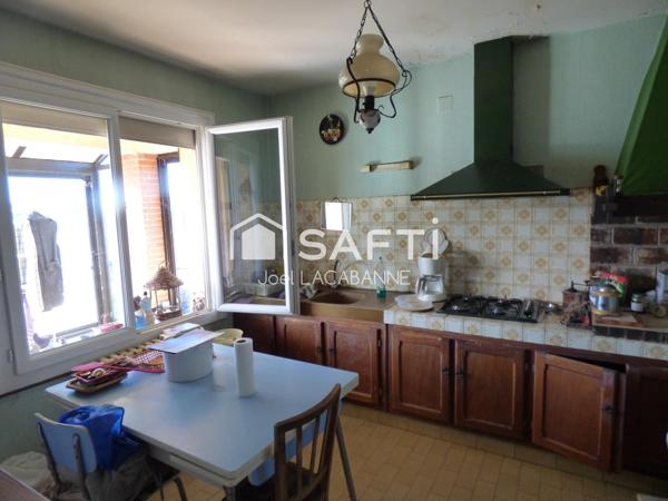 Maison de village de 100 m², sous sol, cuisine aménagée, 3 chambres, véranda