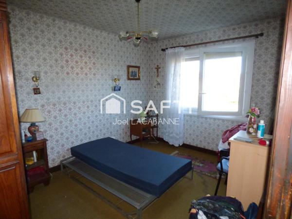 Maison de village de 100 m², sous sol, cuisine aménagée, 3 chambres, véranda